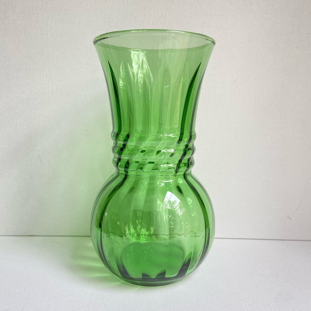 Forest green glass vase with swirled ribs ball body and flared neck Vintage